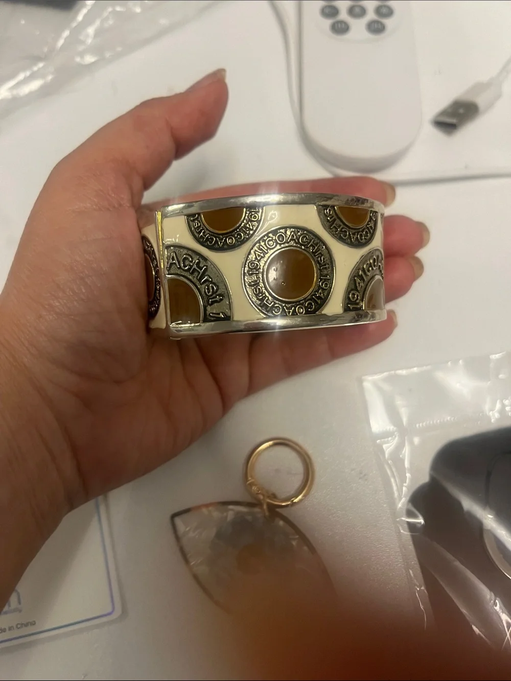 Cream colored coach bracelet - Picture 3 of 3